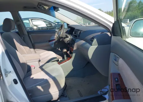 2005 Toyota Corolla Le z USA, uszkodzony, nr VIN 2T1BR30E75C555598